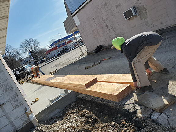Liberty Construction - drive-up beams prior to installation