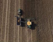 photo of a farmer from the sky looking down