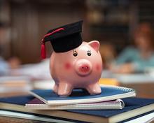 piggy bank with graduation cap