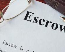 the word escrow on paper