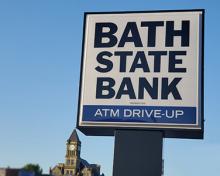 Bath State Bank sign with union county courthouse in background